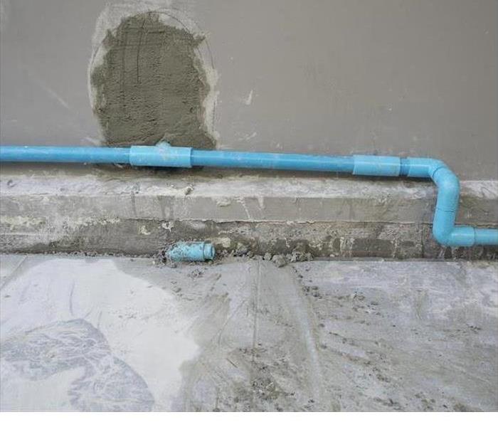 pipe against wall